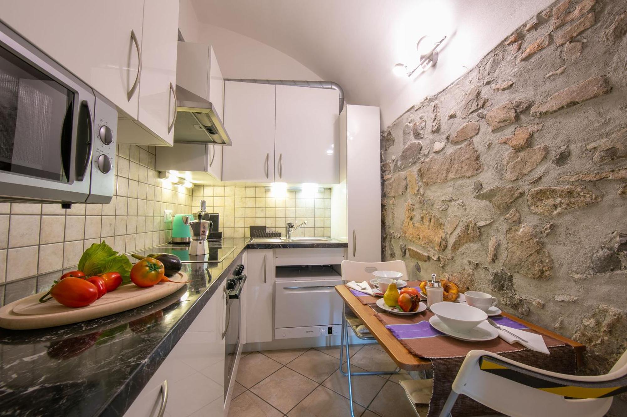 Casa Tame - Happy Rentals Melide Luaran gambar