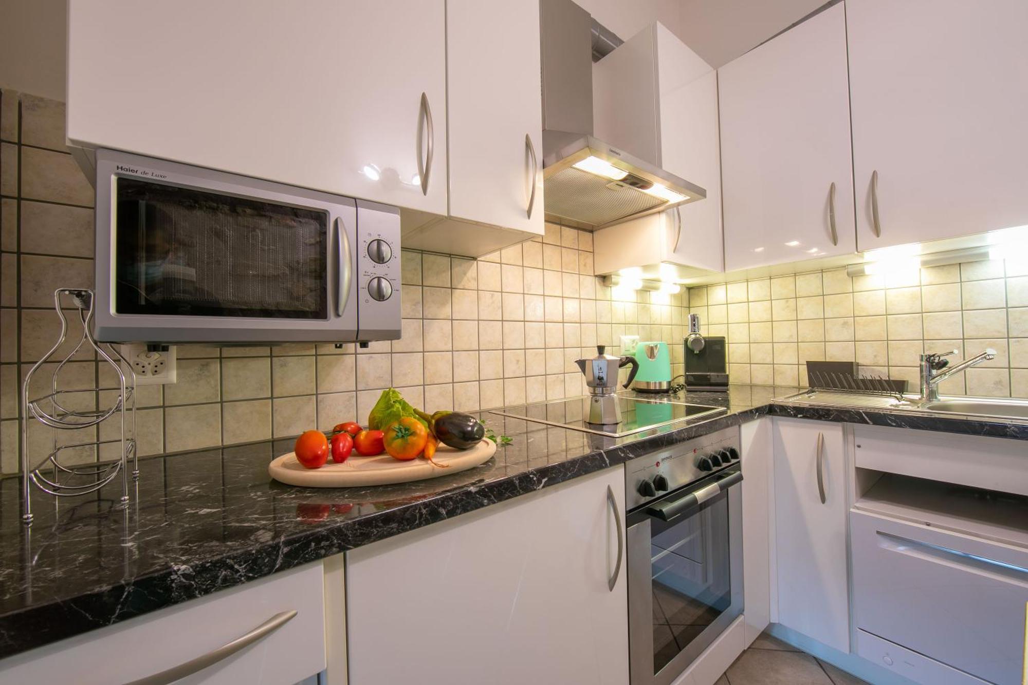 Casa Tame - Happy Rentals Melide Luaran gambar